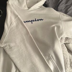 White champion hoodie.